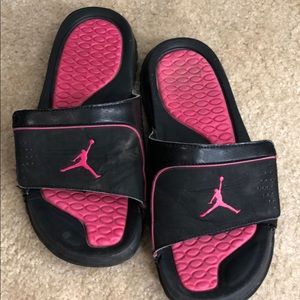 Black and pink Jordan slides